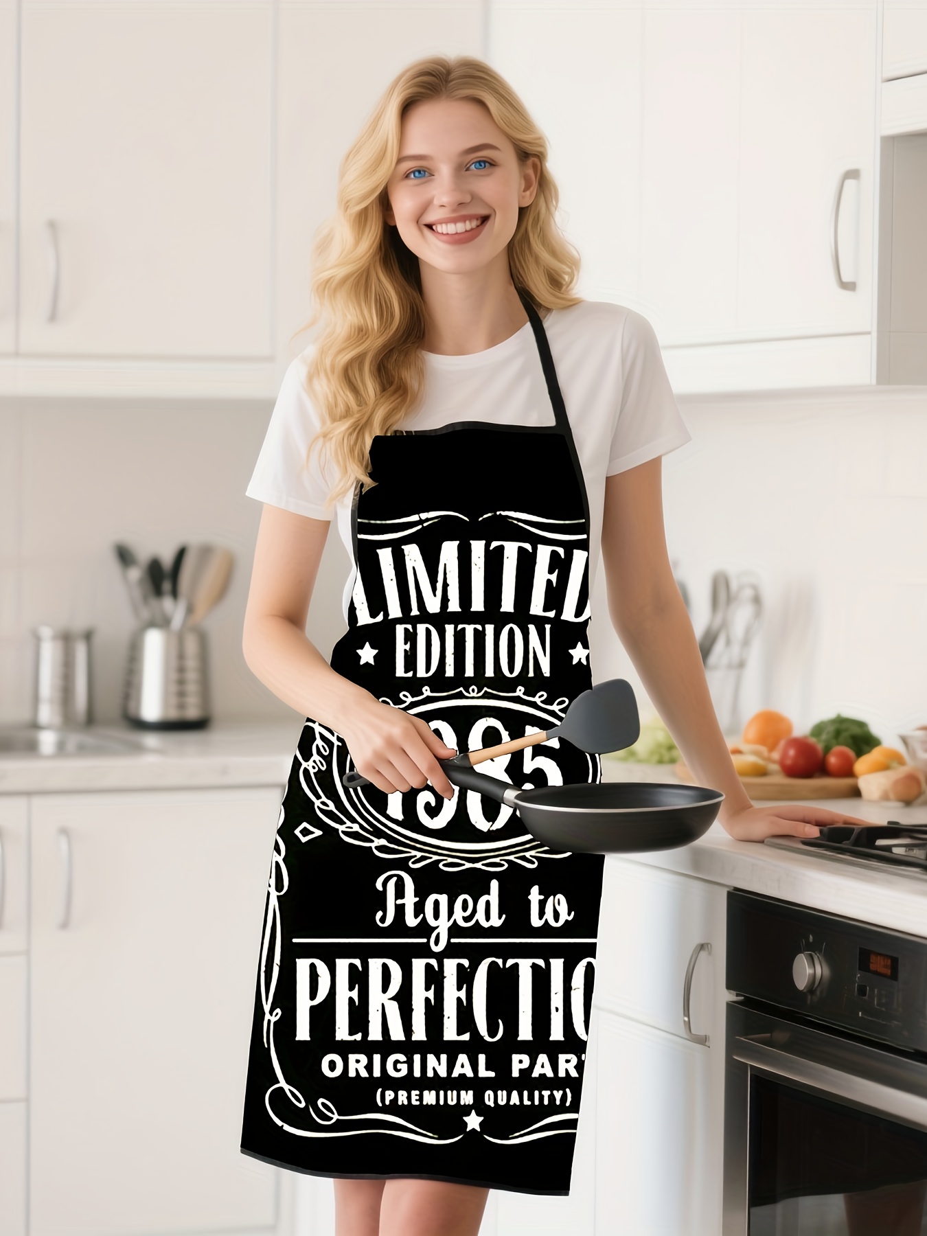 Eine Küchenschürze mit schwarz – Kitchen Baking Background Bewertung und Preis